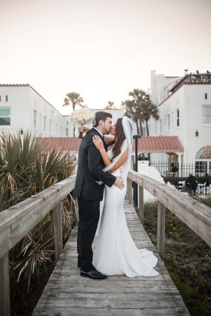 Bride and groom on the boardwalk of Casa Marina Jacksonville Florida