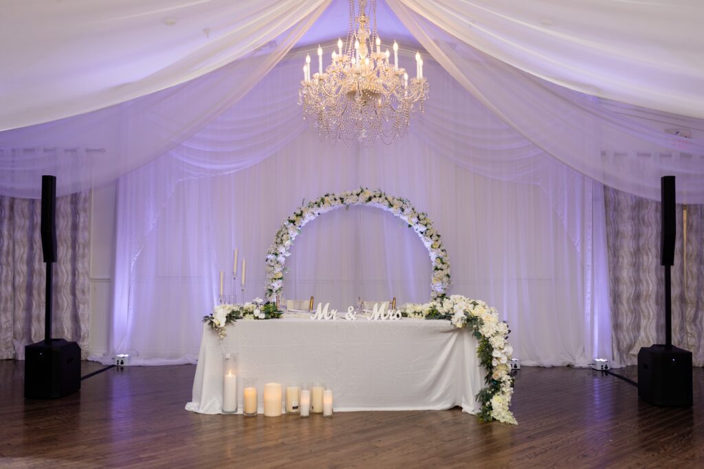 Wedding sweetheart table at the Highland Manor, Apopka, FL | Wedding Photos by Phavy Photography - Apopka Wedding Photographer