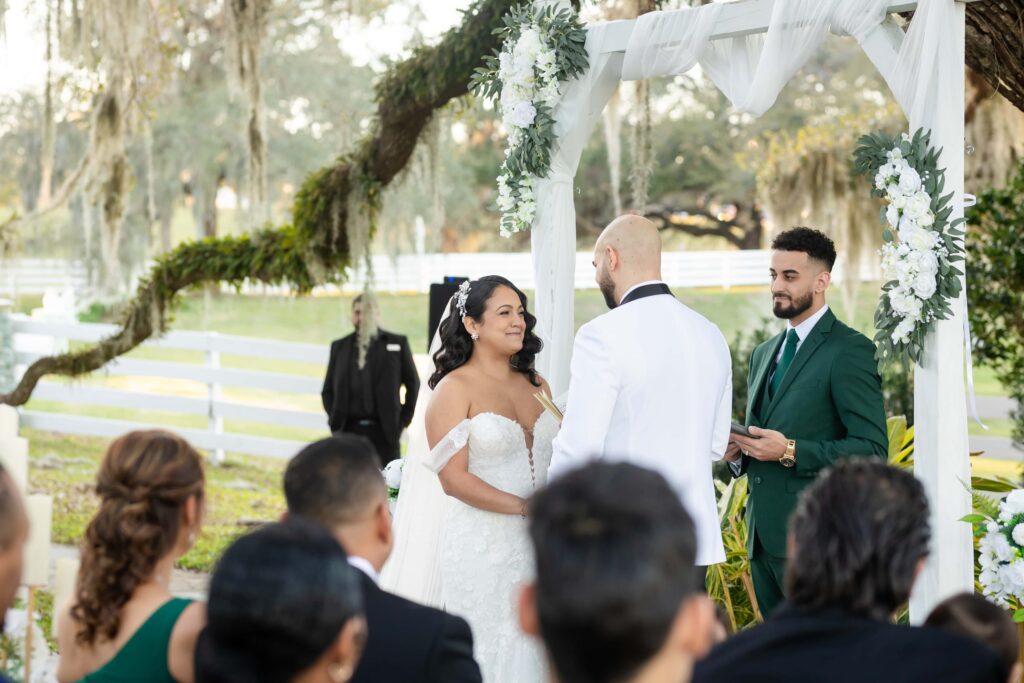 Wedding ceremony under the oak tree at The Highland Manor, a venue near Orlando Florida | Wedding Photography by Phavy Photography - Apopka Wedding Photographer