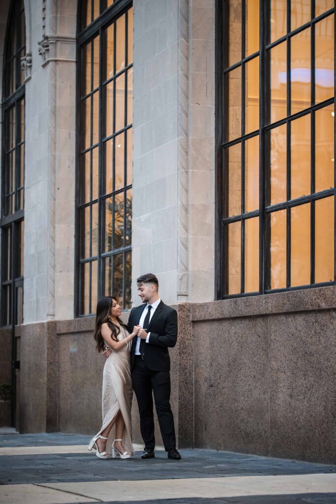 Black and white suit and formal dress for engagement session in Downtown Jacksonville | Phavy Photography, Engagement Photographer in Jacksonville Florida