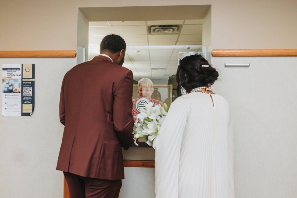 The ladies at the St. Augustine Courthouse are always so happy to see couples getting married there! - Elopement Photos at the St. Augustine Courthouse | St. Augustine Wedding Photographer - Phavy Photography