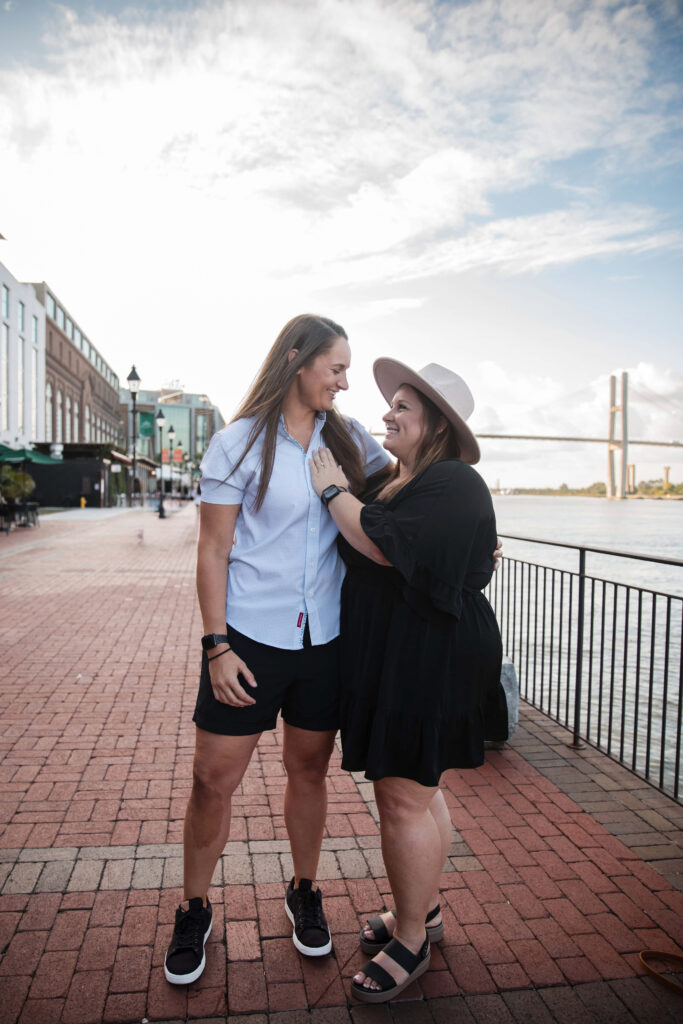 Engagement photos after a proposal at the Savannah Riverwalk