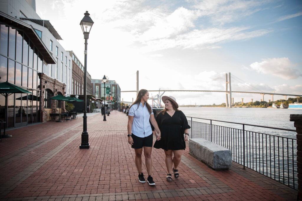 Engagement photos after a proposal at the Savannah Riverwalk