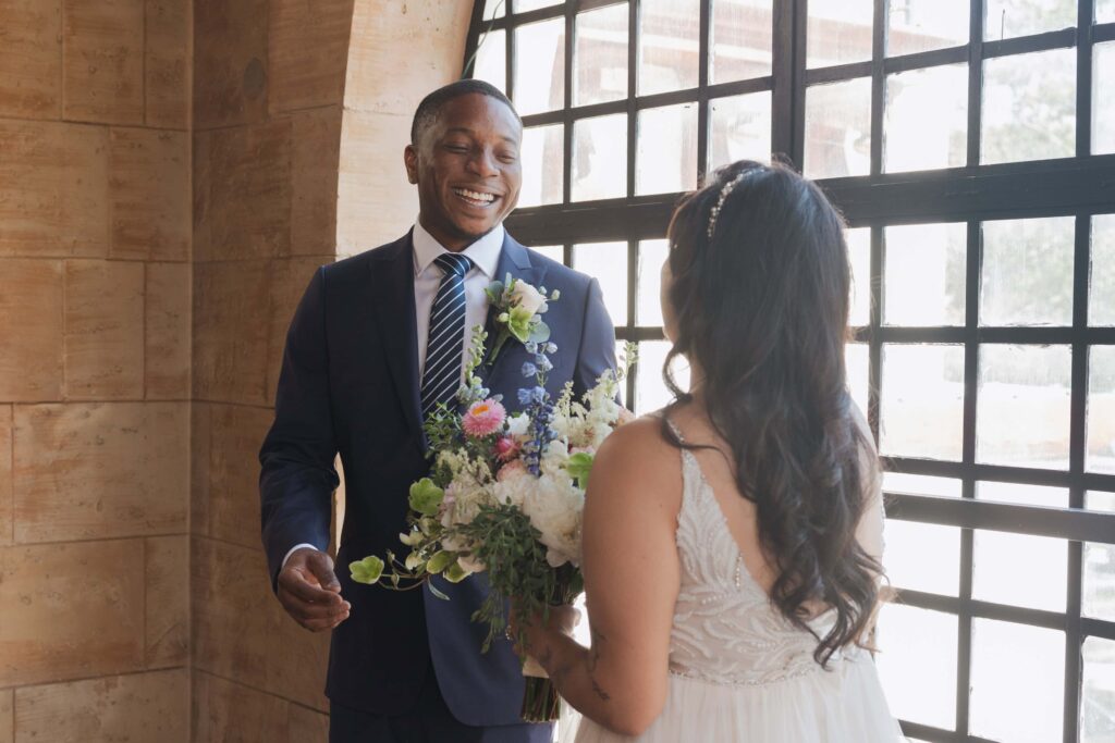 Bride and groom first look at The Treasury, St. Augustine Wedding | Phavy Photography