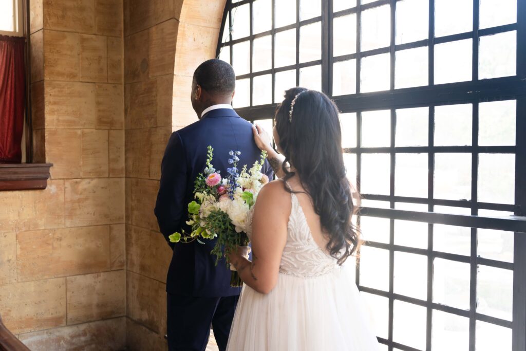 Bride and groom first look at The Treasury, St. Augustine Wedding | Phavy Photography