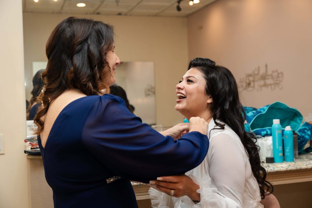 A mother-daughter moment before the wedding at the Treasury, St. Augustine