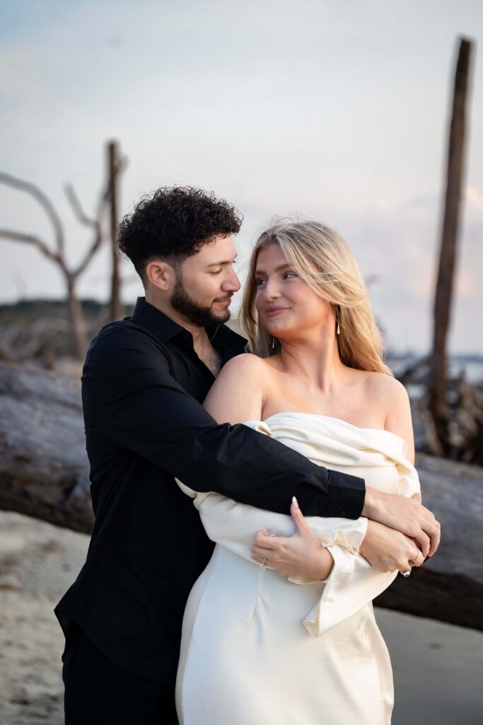 Romantic and timeless, this engagement shot on Jekyll Island showcases the couple’s love in a soft and stunning beach setting