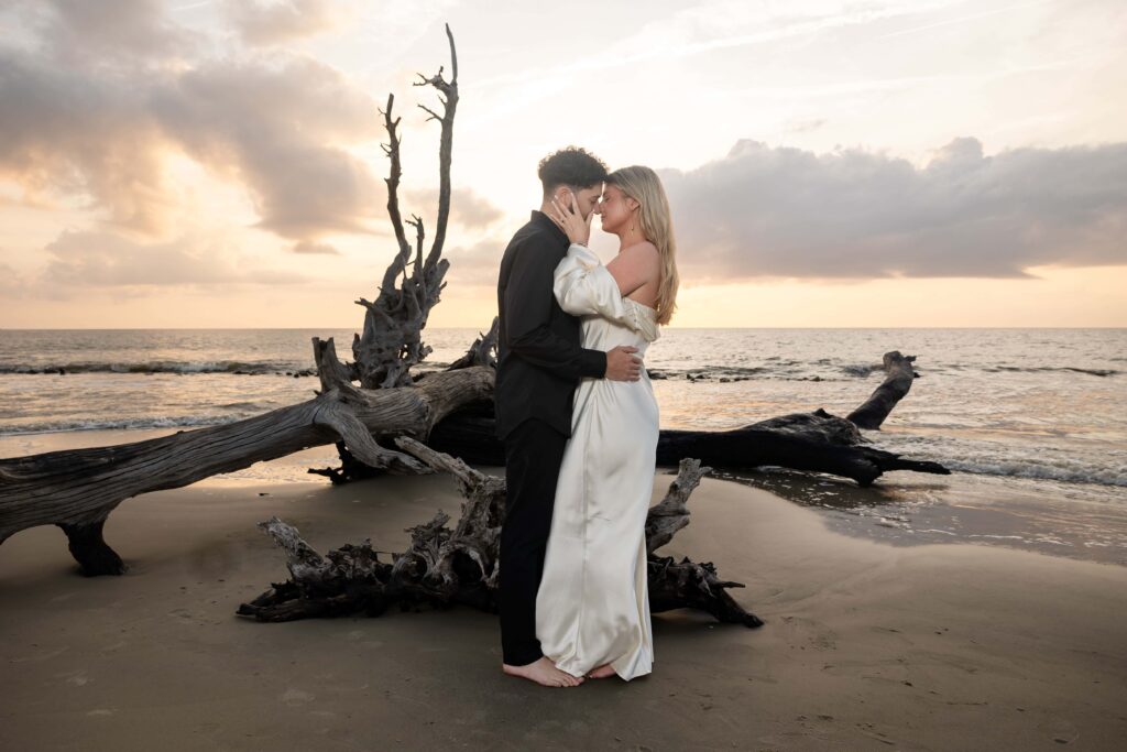 Couple dressed up for beach engagement session in Jekyll, Island