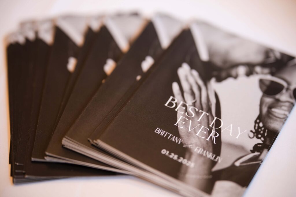 Stylish wedding booklets with photo of bride and groom, designed for a celebration in Orange Park, FL.