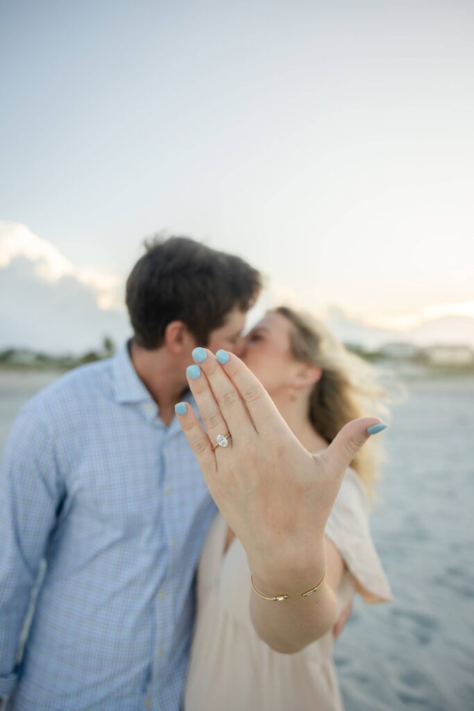Showing off her ring during her engagement session on St Augustine Beach
