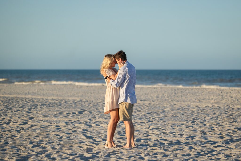 St Augustine beach engagement photographer captures couple enjoying the evening