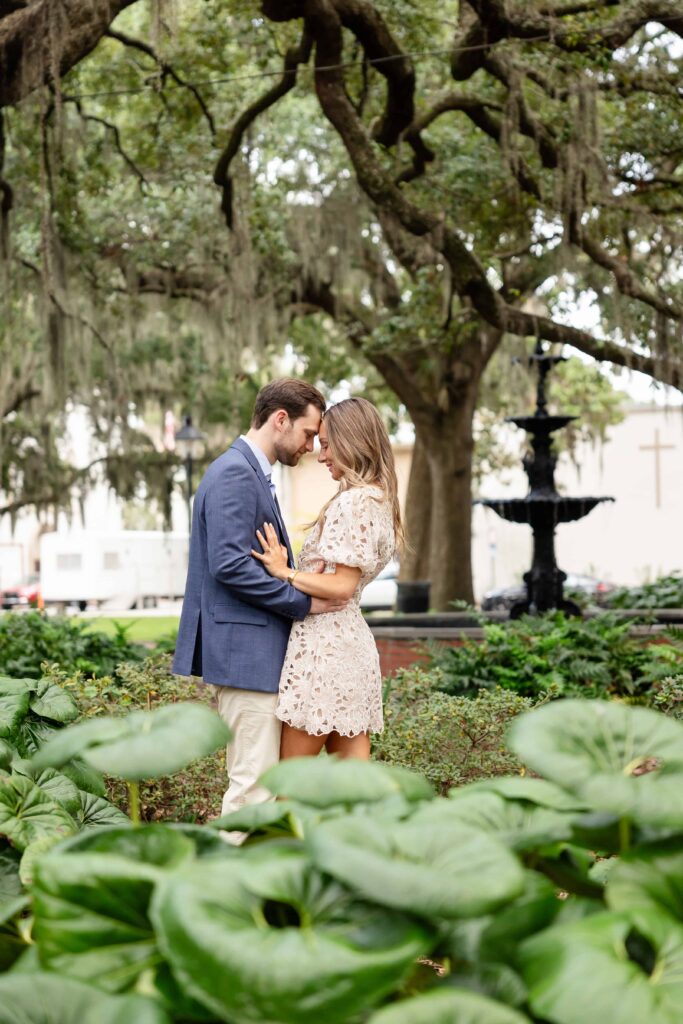 a surprise proposal at Lafayette Square, Savannah GA