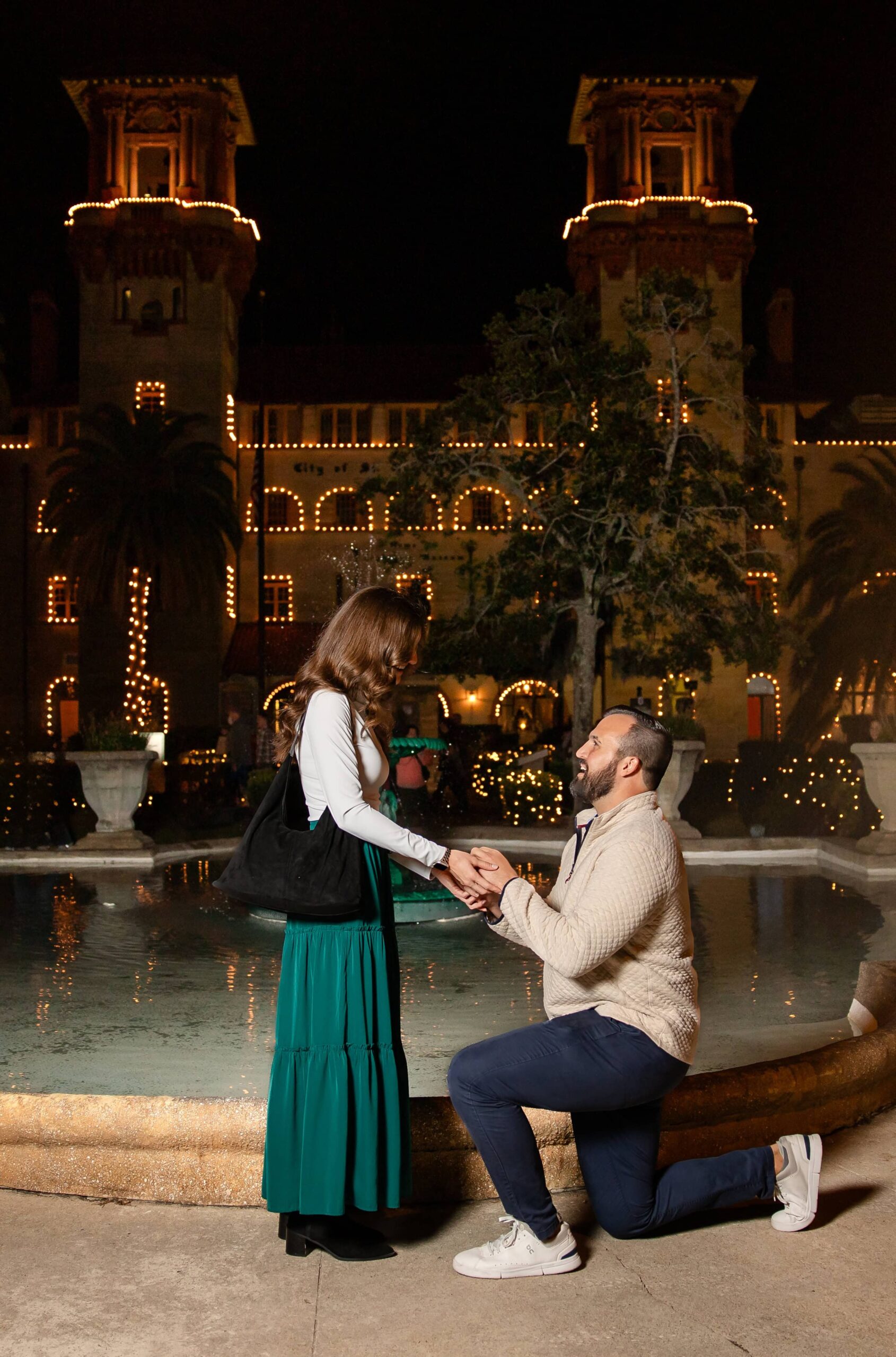 Proposing in front of the Lightner Museum during Nights of Lights