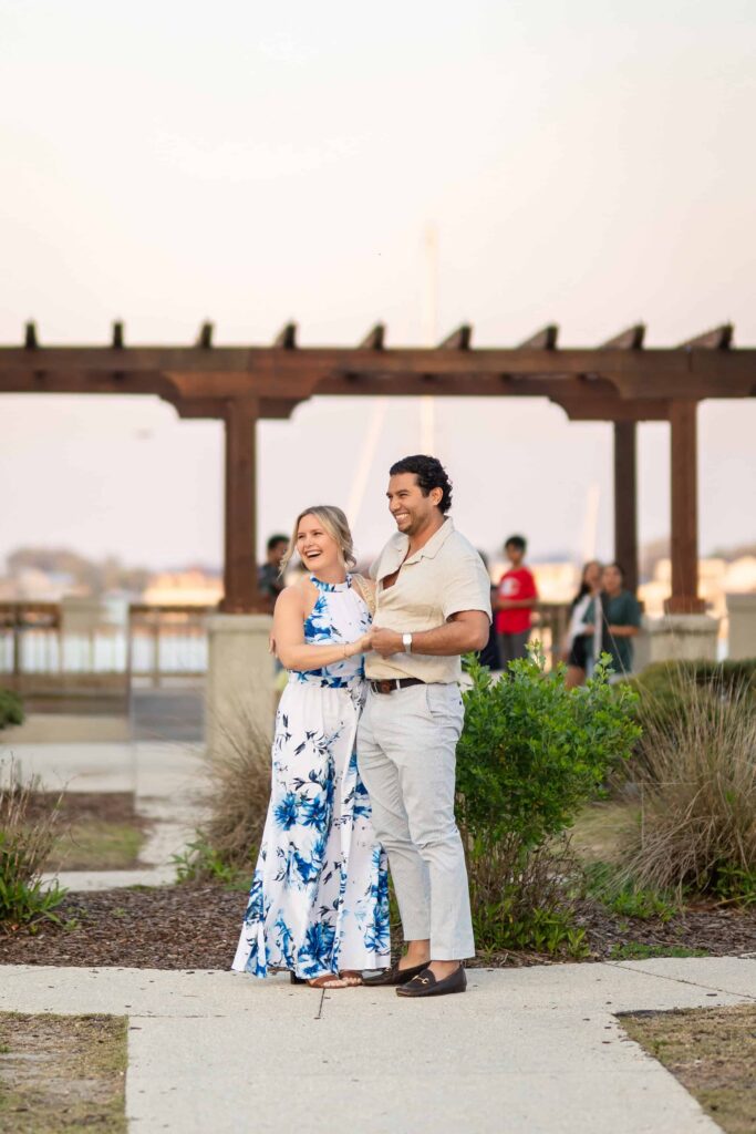 A proposing in St. Augustine at the bay front | Sunset proposal Captured by Phavy Photography, St. Augustine Proposal Photographer
