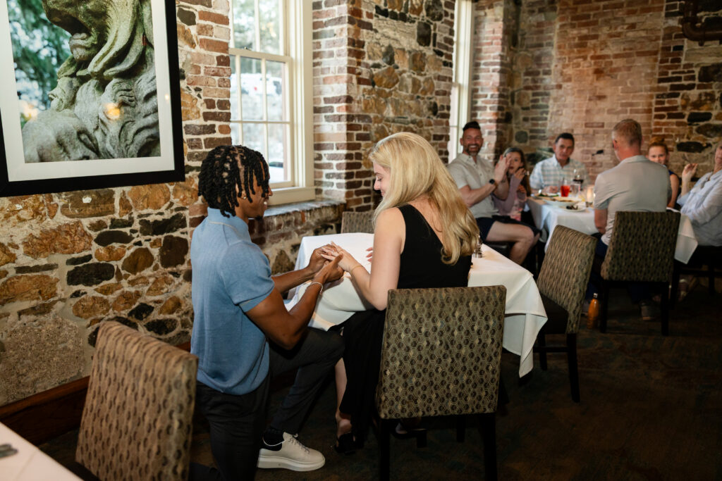 Surprise proposal during dinner at the Chart House in Savannah