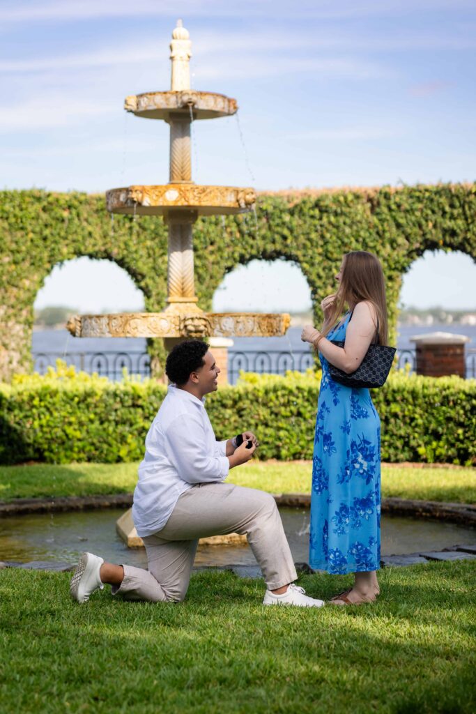 Man proposing in the gardens at the Cummer Museum of Arts & Gardens.