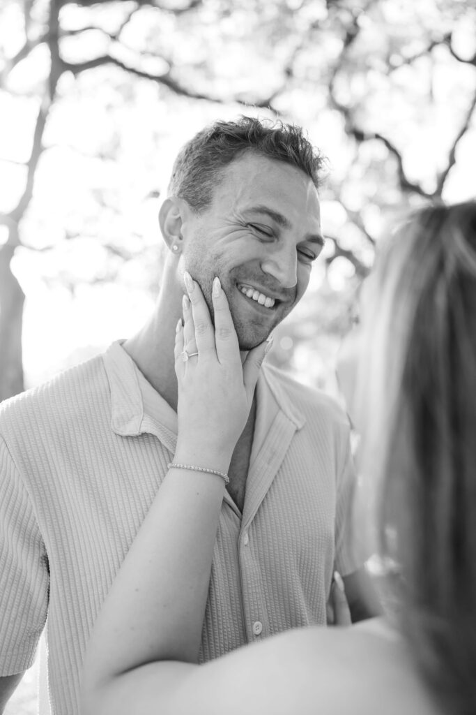 Savannah proposal photographer capturing a surprise engagement at Forsyth Park